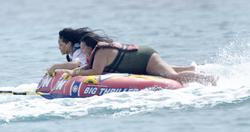 th_380947285_RihannaenjoysafunridewithfriendsonaboatinBarbados_152_122_217lo.jpg